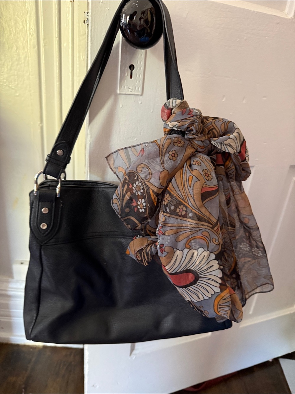 Classic Black Leather Tote Bag with Decorative Scarf